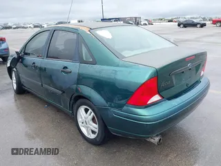 2000 Ford Focus LX with VIN 1FAFP33P8YW336316, listed as a IAAI auction lot 41904496 with 215,100 mi miles and . Bid and sale history available at carsss.com. Image 3.