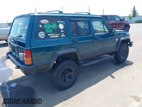 1995 Jeep Cherokee Sport with VIN 1J4FJ68S7SL631078, listed as a IAAI auction lot 42408148 with 190,765 mi miles and . Bid and sale history available at DreamBid. Image 4.