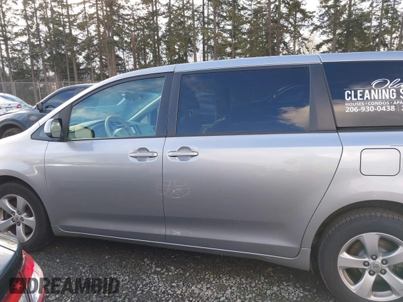 2012 Toyota Sienna with VIN 5TDKA3DC6CS015762, listed as a IAAI auction lot 41529216 with 219,136 mi miles and . Bid and sale history available at DreamBid. Image 14.