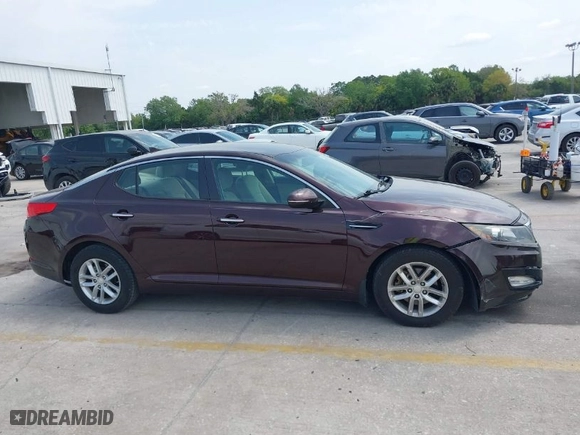 2013 Kia Optima LX with VIN 5XXGM4A72DG203014, listed as a IAAI auction lot 41859589 with 110,099 mi miles. Bid and sale history available at carsss.com. Image 13.