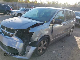 2014 Dodge Grand Caravan SXT z VIN 2C4RDGCG4ER262792, wystawiony jako IAAI lot #40460534 z przebiegiem 245 407 mil mil oraz . Historia ofert i sprzedaży dostępna na DreamBid. Obrazek 2.