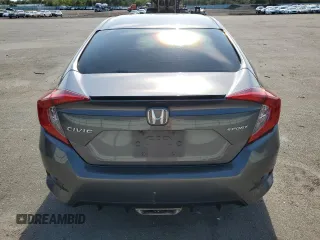 2019 Honda Civic Sport with VIN 19XFC2F83KE051352, listed as a Copart auction lot 59097335 with 97,732 mi miles and Salvage title. Bid and sale history available at DreamBid. Image 6.