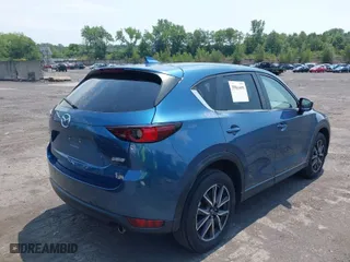 2018 Mazda CX-5 Touring with VIN JM3KFBCM3J0424797, listed as a IAAI auction lot 39864455 with 67,720 mi miles. Bid and sale history available at carsss.com. Image 4.