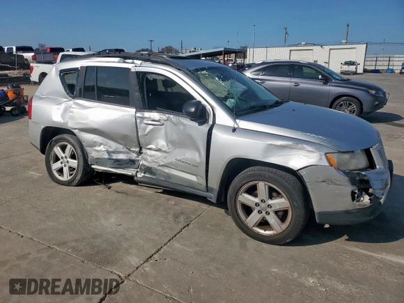 2011 Jeep Compass Limited with VIN 1J4NF5FB3BD257539, listed as a Copart auction lot 49238595 with 124,379 mi miles and Salvage Title. Bid and sale history available at carsss.com. Image 4.
