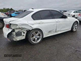 2014 BMW 3 Series 335i xDrive with VIN WBA3B9G51ENR92301, listed as a Copart auction lot 58296885 with 81,988 mi miles and Salvage title. Bid and sale history available at DreamBid. Image 3.