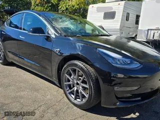 2018 Tesla Model 3 Long Range Battery with VIN 5YJ3E1EA0JF173302, listed as a Copart auction lot 54197265 with 59,956 mi miles and Salvage Title. Bid and sale history available at carsss.com. Image 1.