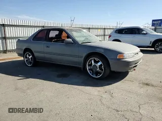 1992 Honda Accord z VIN 1HGCB7254NA015113, wystawiony jako Copart lot #77223284 z przebiegiem 219 007 mil mil oraz Szkoda całkowita • Salvage title. Historia ofert i sprzedaży dostępna na DreamBid. Obrazek 10.