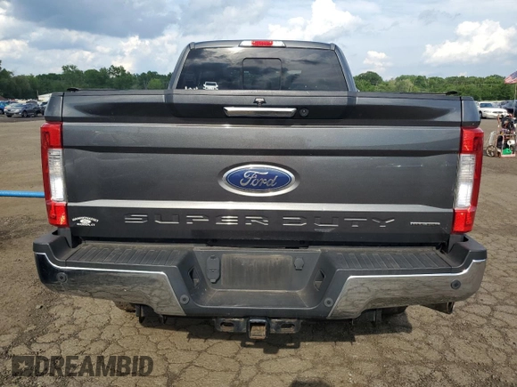 2017 Ford F-250 XLT with VIN 1FT7X2B61HEE53047, listed as a Copart auction lot 63029795 with 113,225 mi miles and Salvage title. Bid and sale history available at DreamBid. Image 6.