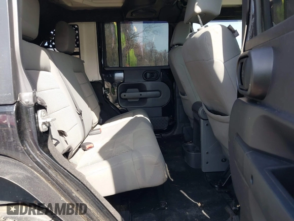 2008 Jeep Wrangler Unlimited Rubicon with VIN 1J8GA691X8L641959, listed as a IAAI auction lot 41586564 with 174,886 mi miles and . Bid and sale history available at DreamBid. Image 8.