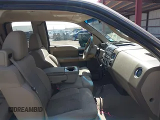 2005 Ford F-150 XLT with VIN 1FTPX14525NA78019, listed as a IAAI auction lot 41932381 with 170,153 mi miles. Bid and sale history available at carsss.com. Image 5.