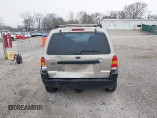 2001 Ford Escape with VIN 1FMUU01B61KE00524, listed as a IAAI auction lot 41486950 with 163,753 mi miles and . Bid and sale history available at DreamBid. Image 16.