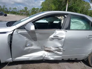 2012 Cadillac CTS with VIN 1G6DM5E37C0126305, listed as a IAAI auction lot 42001466 with 150,566 mi miles and . Bid and sale history available at DreamBid. Image 6.