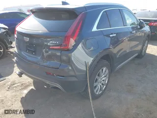 2019 Cadillac XT4 AWD Premium Luxury with VIN 1GYFZDR44KF197830, listed as a IAAI auction lot 41795431 with 54,106 mi miles. Bid and sale history available at carsss.com. Image 4.