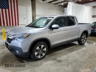 2019 Honda Ridgeline RTL with VIN 5FPYK3F50KB022822, listed as a Copart auction lot 62006095 with 57,205 mi miles and Salvage title. Bid and sale history available at DreamBid. Image 1.