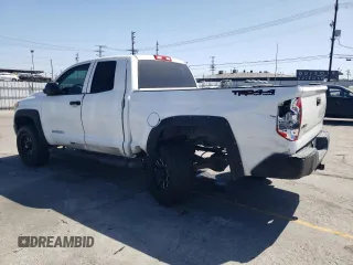 2014 Toyota Tundra SR z VIN 5TFUM5F10EX056473, wystawiony jako Copart lot #56758265 z przebiegiem 129 656 mil mil oraz Szkoda całkowita • Salvage title. Historia ofert i sprzedaży dostępna na DreamBid. Obrazek 2.
