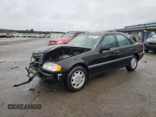 1996 Mercedes-Benz C with VIN WDBHA28E7TF328169, listed as a Copart auction lot 83653124 with 282,232 mi miles and Salvage Title. Bid and sale history available at carsss.com. Image 1.