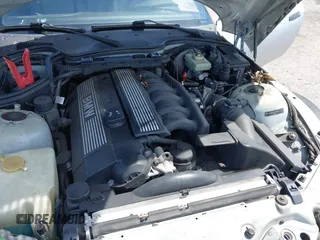 1997 BMW 3 Series 2.8L with VIN 4USCJ3326VLC03034, listed as a IAAI auction lot 41921342 with 155,896 mi miles. Bid and sale history available at carsss.com. Image 6.