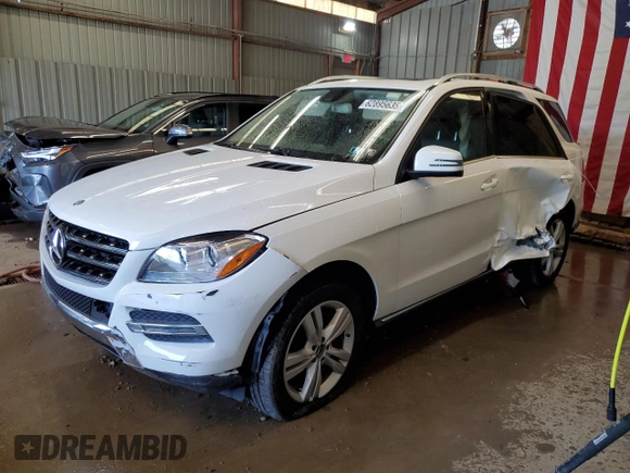 2015 Mercedes-Benz M 350 with VIN 4JGDA5HB8FA582087, listed as a Copart auction lot 62895635 with 95,928 mi miles and Salvage title. Bid and sale history available at DreamBid. Image 1.