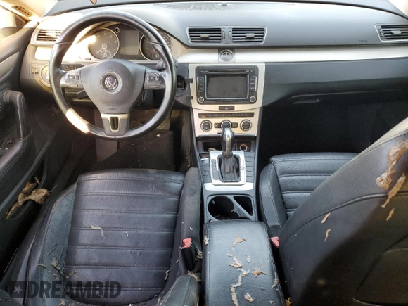 2013 Volkswagen CC Sport with VIN WVWBP7ANXDE525051, listed as a Copart auction lot 70659744 with 293,611 mi miles and Salvage Title. Bid and sale history available at DreamBid. Image 8.