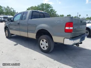 2004 Ford F-150 XLT with VIN 1FTPX14574NA33950, listed as a IAAI auction lot 41966655 with 160,523 mi miles. Bid and sale history available at carsss.com. Image 3.