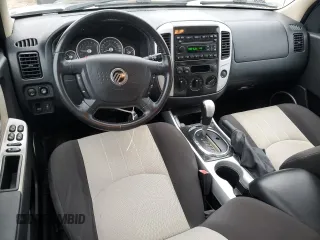 2005 Mercury Mariner Luxury z VIN 4M2CU56175DJ15493, wystawiony jako Copart lot #87480494 z przebiegiem 73 321 mil mil oraz Czysty tytuł • Clean title. Historia ofert i sprzedaży dostępna na DreamBid. Obrazek 8.