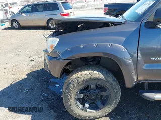 2014 Toyota Tacoma with VIN 5TFLU4EN1EX108137, listed as a IAAI auction lot 41691253 with 119,820 mi miles. Bid and sale history available at carsss.com. Image 19.