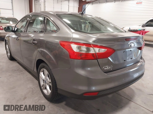 2013 Ford Focus SE with VIN 1FADP3F26DL359581, listed as a IAAI auction lot 42129909 with 129,832 mi miles. Bid and sale history available at carsss.com. Image 3.