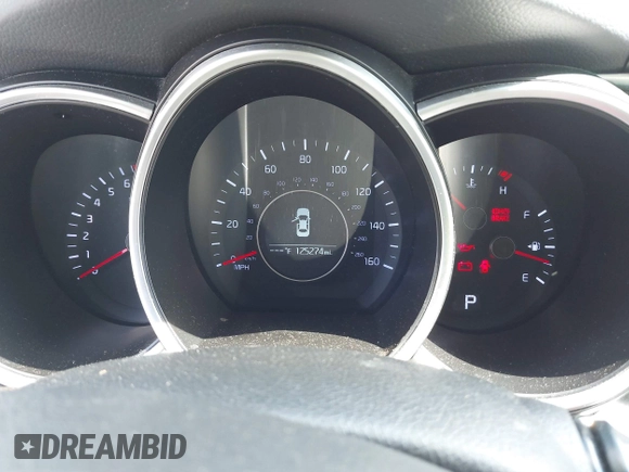 2015 Kia Optima LX with VIN 5XXGM4A79FG477619, listed as a IAAI auction lot 42561432 with 125,274 mi miles and . Bid and sale history available at DreamBid. Image 7.
