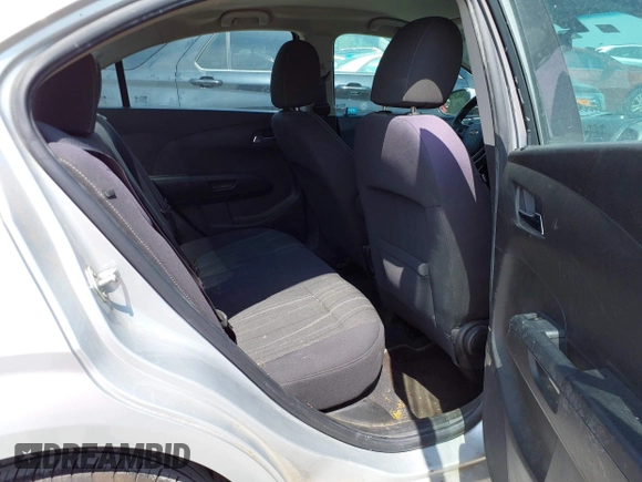 2014 Chevrolet Sonic LT with VIN 1G1JC5SH0E4210327, listed as a IAAI auction lot 42069313 with 94,506 mi miles and . Bid and sale history available at DreamBid. Image 8.
