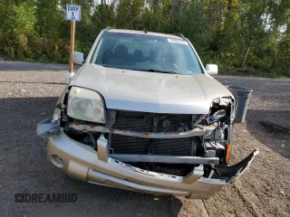 2006 Nissan X-Trail XE z VIN JN8BT08T06W100432, wystawiony jako Copart lot #70907374 z przebiegiem 263 759 mil mil oraz Szkody całkowita. Historia ofert i sprzedaży dostępna na DreamBid. Obrazek 5.