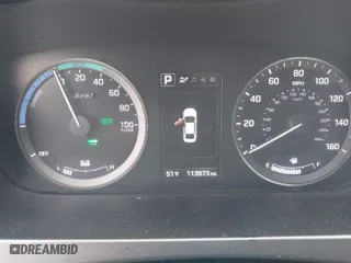 2016 Hyundai Sonata Hybrid SE with VIN KMHE24L19GA016998, listed as a IAAI auction lot 42094128 with 113,973 mi miles. Bid and sale history available at carsss.com. Image 7.