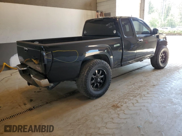 2010 GMC Canyon SLE1 with VIN 1GTJTCDE0A8101092, listed as a Copart auction lot 52311654 with 133,742 mi miles and Salvage title. Bid and sale history available at DreamBid. Image 3.