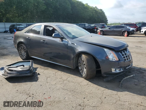 2013 Cadillac CTS Performance z VIN 1G6DK5E3XD0104466, wystawiony jako Copart lot #57479555 z przebiegiem Nie podano mil oraz Szkoda całkowita • Salvage title. Historia ofert i sprzedaży dostępna na DreamBid. Obrazek 4.