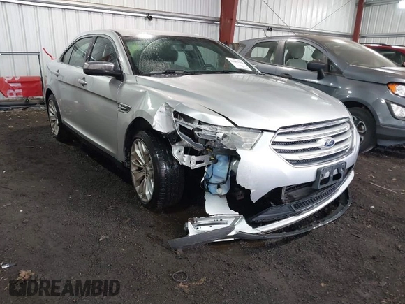 2014 Ford Taurus Limited with VIN 1FAHP2F81EG101351, listed as a IAAI auction lot 41662308 with 139,542 mi miles. Bid and sale history available at carsss.com. Image 1.