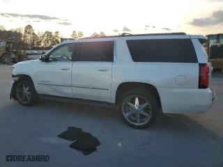 2015 Chevrolet Suburban LT with VIN 1GNSKJKC2FR638780, listed as a Copart auction lot 47360345 with 156,884 mi miles and Salvage Title. Bid and sale history available at carsss.com. Image 2.