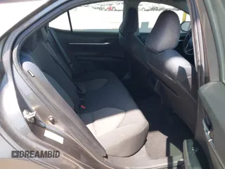2019 Toyota Camry LE with VIN 4T1B11HK8KU204599, listed as a IAAI auction lot 42096889 with 76,518 mi miles and . Bid and sale history available at DreamBid. Image 8.