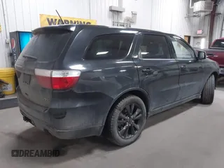 2013 Dodge Durango R/T z VIN 1C4SDJCT4DC670406, wystawiony jako IAAI lot #41685272 z przebiegiem 230 767 mil mil oraz . Historia ofert i sprzedaży dostępna na DreamBid. Obrazek 4.