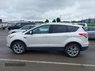 2016 Ford Escape Titanium with VIN 1FMCU9JX4GUB72080, listed as a IAAI auction lot 42519240 with 121,793 mi miles and . Bid and sale history available at DreamBid. Image 14.