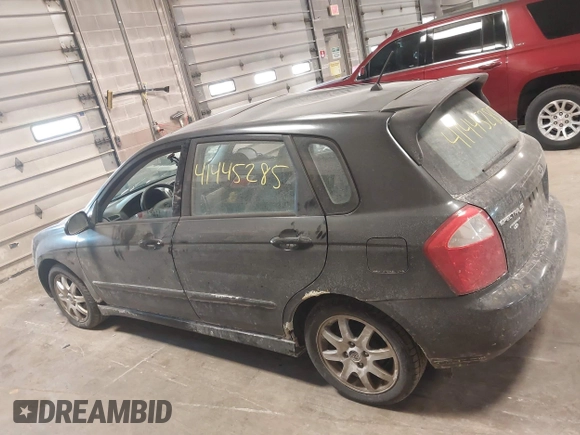 2005 Kia Spectra with VIN KNAFE161255083357, listed as a IAAI auction lot 41445285 with 90,349 mi miles. Bid and sale history available at carsss.com. Image 15.