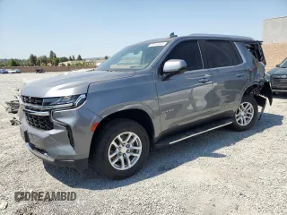 2021 Chevrolet Tahoe LS with VIN 1GNSCMKD3MR227893, listed as a Copart auction lot 65713735 with 87,255 mi miles and Salvage title. Bid and sale history available at DreamBid. Image 1.