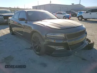 2015 Dodge Charger SXT with VIN 2C3CDXHG8FH769883, listed as a Copart auction lot 87723825 with 81,859 mi miles and Salvage Title. Bid and sale history available at DreamBid. Image 11.