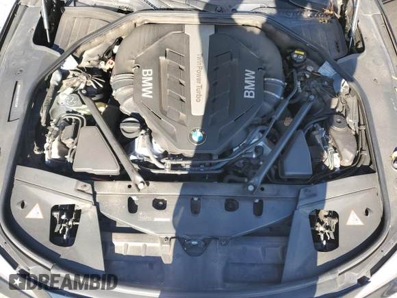 2015 BMW 7 Series 750i xDrive with VIN WBAYB6C57FD965993, listed as a Copart auction lot 83871924 with 76,720 mi miles and Salvage Title. Bid and sale history available at carsss.com. Image 11.