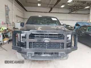 2015 Ford F-150 XLT with VIN 1FTEW1EPXFKE99354, listed as a IAAI auction lot 42245005 with 160,164 mi miles and . Bid and sale history available at DreamBid. Image 12.
