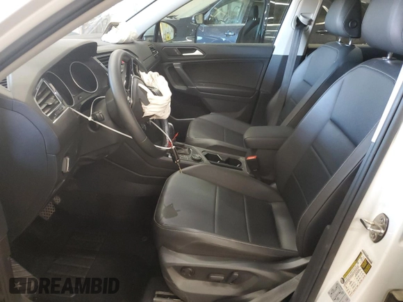 2020 Volkswagen Tiguan SE with VIN 3VV2B7AXXLM058031, listed as a Copart auction lot 76522644 with 34,361 mi miles and Salvage Title. Bid and sale history available at DreamBid. Image 7.