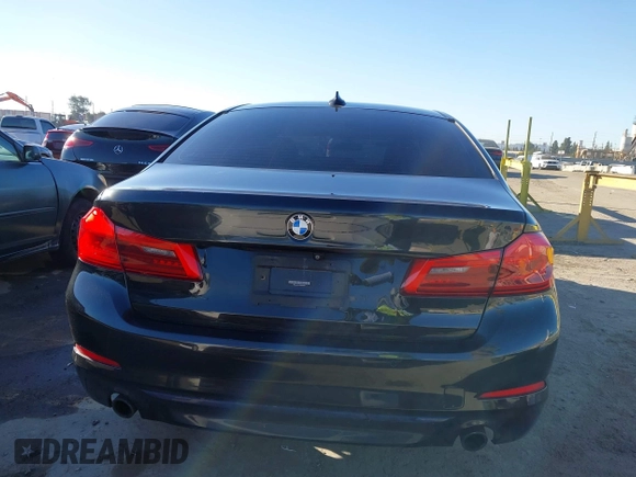 2019 BMW 5 Series 530e with VIN WBAJA9C57KB399541, listed as a IAAI auction lot 41656775 with 96,523 mi miles and . Bid and sale history available at DreamBid. Image 16.
