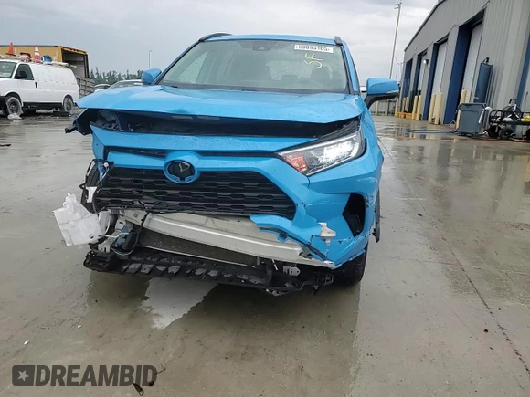 2021 Toyota RAV4 XLE with VIN 2T3P1RFV2MC142047, listed as a Copart auction lot 59095105 with 90,624 mi miles and Salvage title. Bid and sale history available at DreamBid. Image 14.