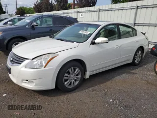 2010 Nissan Altima S with VIN 1N4AL2AP7AN430105, listed as a Copart auction lot 60661565 with 185,804 mi miles and Salvage title. Bid and sale history available at DreamBid. Image 1.