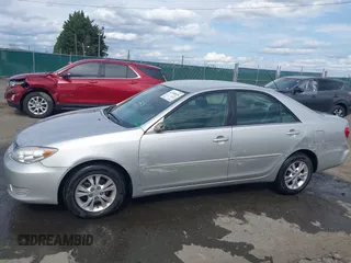 2005 Toyota Camry LE with VIN 4T1BF30K35U608097, listed as a IAAI auction lot 41908838 with 75,601 mi miles and . Bid and sale history available at DreamBid. Image 14.