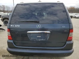 2001 Mercedes-Benz M-Class with VIN 4JGAB54E61A276417, listed as a Copart auction lot 82878094 with 205,577 mi miles and Salvage Title. Bid and sale history available at carsss.com. Image 6.