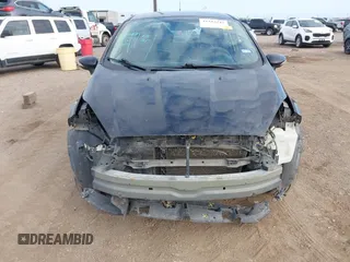 2018 Ford Fiesta SE z VIN 3FADP4BJ0JM139172, wystawiony jako IAAI lot #41212242 z przebiegiem 160 238 mil mil oraz . Historia ofert i sprzedaży dostępna na DreamBid. Obrazek 6.